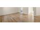 Hardwood floors throughout this spacious bedroom at 8350 Farmette Bnd, Chattahoochee Hills, GA 30268