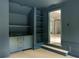 Finished basement with wet bar, built-in shelving, and neutral carpeting at 8350 Farmette Bnd, Chattahoochee Hills, GA 30268