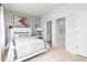 Bright bedroom with a queen-size bed and access to a full bathroom at 355 Skylar Se Way, Atlanta, GA 30315