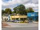 Aerial view of a vibrant community with various shops and restaurants at 355 Skylar Se Way, Atlanta, GA 30315