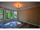 Dining room with bay window and chandelier at 1077 Memory Ln, Lawrenceville, GA 30044