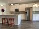 Modern kitchen with white cabinets, and stainless steel appliances at 3370 Reagan Way # 84, Lawrenceville, GA 30044