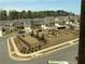 Aerial view of a new home community with playground and dog park at 3370 Reagan Way # 84, Lawrenceville, GA 30044