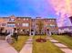 Attractive brick townhome with landscaped lawn and walkway at 3370 Reagan Way # 84, Lawrenceville, GA 30044