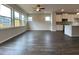 Open living room with hardwood floors and lots of natural light at 3370 Reagan Way # 84, Lawrenceville, GA 30044