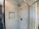 Modern shower with clean gray tile and a rainfall shower head at 3370 Reagan Way # 84, Lawrenceville, GA 30044