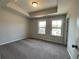 Bright bedroom with neutral carpeting and two large windows at 3370 Reagan Way # 84, Lawrenceville, GA 30044