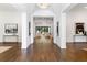 Bright and spacious entryway with hardwood floors and views into the living areas at 1107 E Beechwood Nw Dr, Atlanta, GA 30327