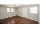 Spacious bedroom with hardwood floors and ample natural light at 2656 County Line Sw Rd, Atlanta, GA 30331