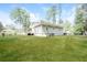 Rear view of house with deck and spacious yard at 2656 County Line Sw Rd, Atlanta, GA 30331