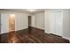 Main bedroom with hardwood floors and private bathroom access at 2656 County Line Sw Rd, Atlanta, GA 30331