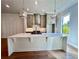Modern kitchen with stainless steel appliances and large island at 285 Briscoe Way # 2, Alpharetta, GA 30009