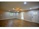 Bright living room featuring hardwood floors and recessed lighting at 4131 Tara Dr, Forest Park, GA 30297