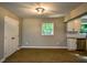 Formal dining area with hardwood floors and built-in shelving at 4131 Tara Dr, Forest Park, GA 30297