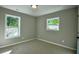 Bright bedroom with neutral walls, carpet, and ample natural light at 4131 Tara Dr, Forest Park, GA 30297