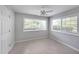 Bright bedroom with tile floors and neutral walls at 1468 Briarwood Rd # 805, Brookhaven, GA 30319