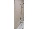 Clean bathroom with beige tile, shower and tub at 1468 Briarwood Rd # 805, Brookhaven, GA 30319