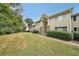 Tan two-story building with stone accents and landscaping at 1468 Briarwood Rd # 805, Brookhaven, GA 30319