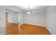 Hardwood floor dining room with pendant lighting at 1468 Briarwood Rd # 805, Brookhaven, GA 30319