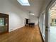 Sunlit game room with hardwood floors and pool table at 1935 Lamp Post Ln, Lawrenceville, GA 30043