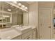 Bathroom boasts a double vanity and updated fixtures at 8015 St Marlo Country Club Pkwy, Duluth, GA 30097