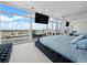 Main bedroom with stunning city views and tufted bed at 45 Ivan Allen Jr Nw Blvd # 2306, Atlanta, GA 30308