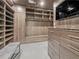 Large walk-in closet with ample shelving and drawers at 45 Ivan Allen Jr Nw Blvd # 2306, Atlanta, GA 30308
