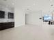 Modern kitchen with marble countertops and dark wood cabinets at 45 Ivan Allen Jr Nw Blvd # 2306, Atlanta, GA 30308