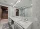 Modern bathroom with double vanity and marble countertops at 45 Ivan Allen Jr Nw Blvd # 2306, Atlanta, GA 30308