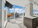 Modern kitchen with marble countertops and city views at 45 Ivan Allen Jr Nw Blvd # 2306, Atlanta, GA 30308