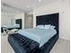 Luxurious bedroom with a tufted headboard and city views at 45 Ivan Allen Jr Nw Blvd # 2306, Atlanta, GA 30308
