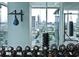 Modern gym with city views and weight training equipment at 45 Ivan Allen Jr Nw Blvd # 2306, Atlanta, GA 30308