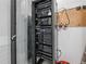 Organized media closet with various A/V components at 45 Ivan Allen Jr Nw Blvd # 2306, Atlanta, GA 30308