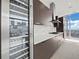 Sleek kitchen with stainless steel wine cooler and cabinetry at 45 Ivan Allen Jr Nw Blvd # 2306, Atlanta, GA 30308