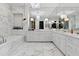 Spacious bathroom with marble finishes and a large soaking tub at 3630 Peachtree Rd # 3302, Atlanta, GA 30326