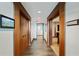 Hallway with wood floors and access to media room at 3630 Peachtree Rd # Ph3302, Atlanta, GA 30326