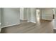 Dining room features neutral walls and wood-look flooring at 4140 Alveston Dr, Atlanta, GA 30349