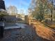 Backyard view with wooden fence and patio at 3390 Wake Robin Way, Cumming, GA 30040