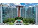Modern high rise building with pool, balconies, and landscaped grounds at 44 Peachtree Ne Pl # 424, Atlanta, GA 30309