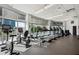 Well-equipped fitness center with treadmills, ellipticals, and stationary bikes at 44 Peachtree Ne Pl # 424, Atlanta, GA 30309