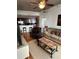 Inviting living room featuring hardwood floors, a ceiling fan, and comfortable seating at 44 Peachtree Ne Pl # 424, Atlanta, GA 30309
