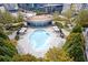 Relaxing pool area with ample lounge chairs and green landscaping at 44 Peachtree Ne Pl # 424, Atlanta, GA 30309