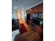 Modern kitchen with stainless steel appliances and hardwood floors at 44 Peachtree Ne Pl # 424, Atlanta, GA 30309