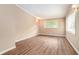 Living room featuring hardwood floors and large windows at 3136 Beech Dr, Atlanta, GA 30344