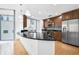 Modern kitchen with stainless steel appliances and a breakfast bar at 222 12Th Ne St # 702, Atlanta, GA 30309