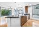 Contemporary kitchen featuring stainless steel appliances and dark wood cabinetry at 222 12Th Ne St # 702, Atlanta, GA 30309