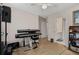 Bedroom with built-in shelving and view of adjacent bathroom at 2600 Wells Sw Ter, Atlanta, GA 30331