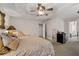 Bright main bedroom with king-size bed and access to the bathroom at 2600 Wells Sw Ter, Atlanta, GA 30331