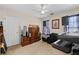 Music-themed bedroom with instruments and ample storage at 2600 Wells Sw Ter, Atlanta, GA 30331