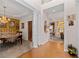 Bright and spacious entryway with hardwood floors and views into the dining room and living areas at 2600 Wells Sw Ter, Atlanta, GA 30331
